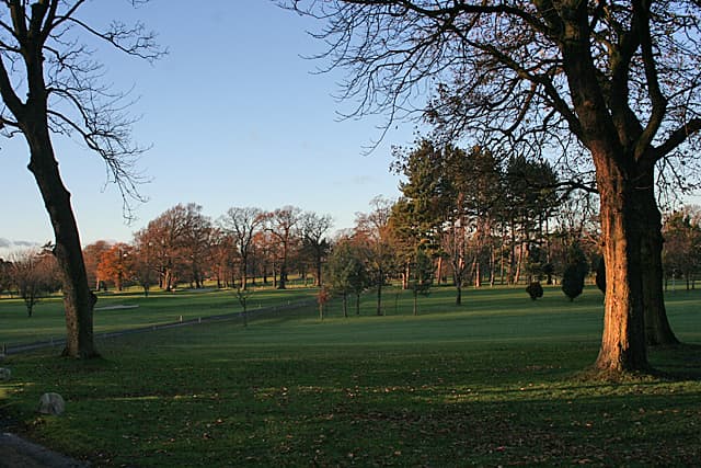 Parkland fairways under mature trees at Ratho Park, on a winter afternoon