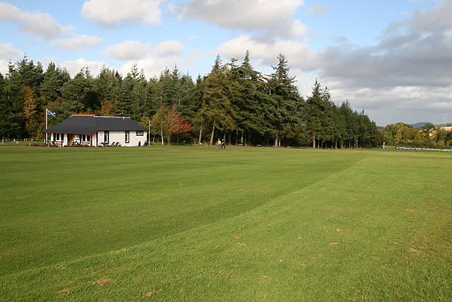 Looking down the 1st fairway at Gifford, the clubhouse on the left