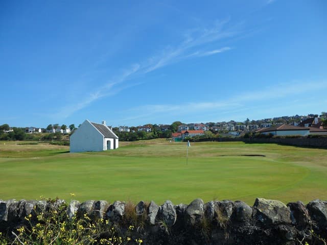 A green on the links at West Kilbride, the village beyond